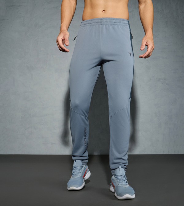 تكنوسبورت  - رمادي Track Pants & Joggers