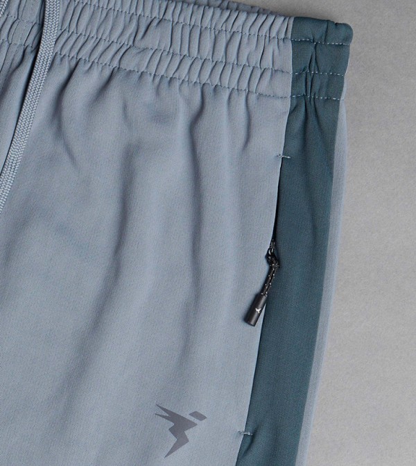 تكنوسبورت  - رمادي Track Pants & Joggers
