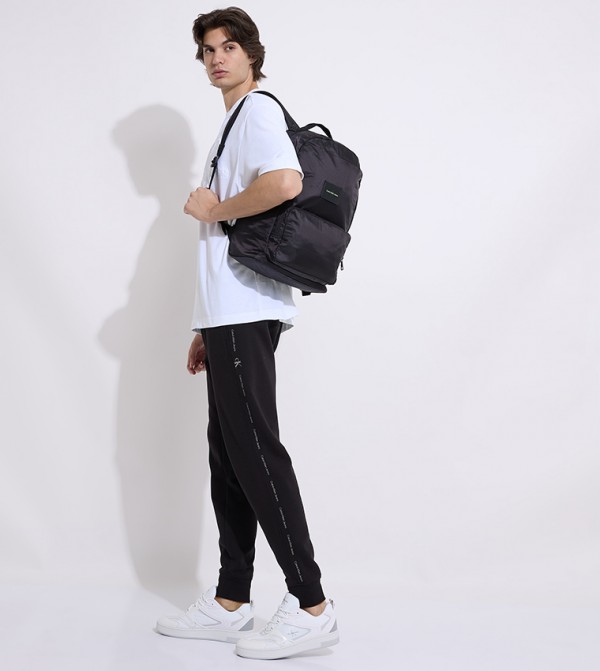 كالفين كلاين  بنطلونات و تشينو  - أسود جوغر