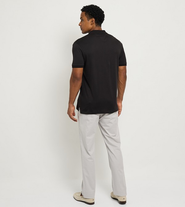 Tommy Hilfiger  T-Shirts - Black Polo T-shirts