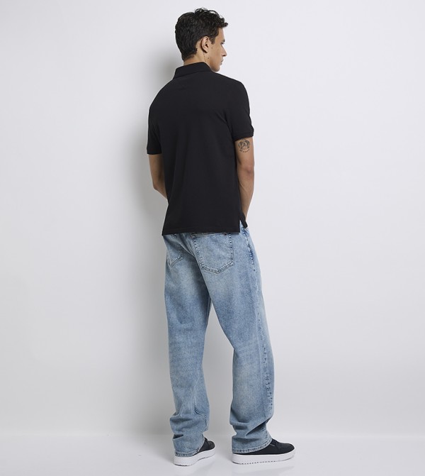 Tommy Hilfiger  T-Shirts - Black Polo T-shirts