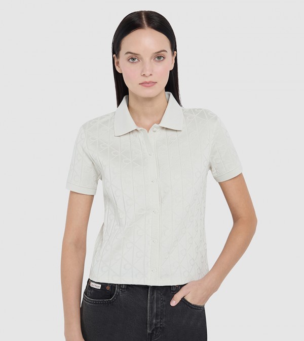 كالفن كلاين جينز  ملابس - عاجي  قمصان بولو