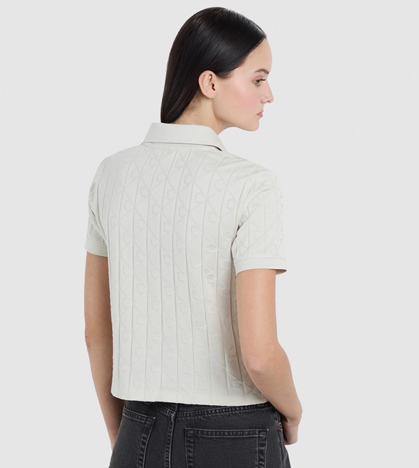 كالفن كلاين جينز  ملابس - عاجي  قمصان بولو