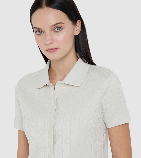 كالفن كلاين جينز  ملابس - عاجي  قمصان بولو