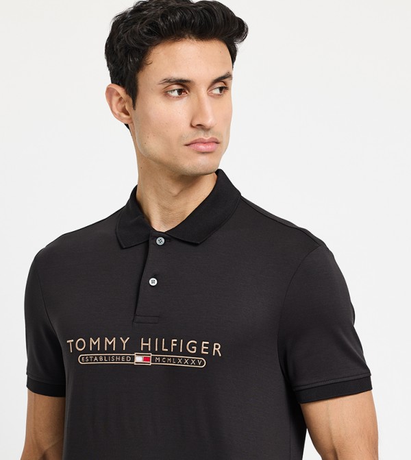 تومي هيلفيغر  ملابس - أسود قمصان بولو