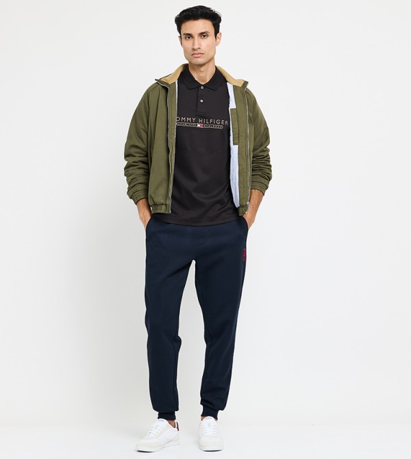 تومي هيلفيغر  ملابس - أسود قمصان بولو