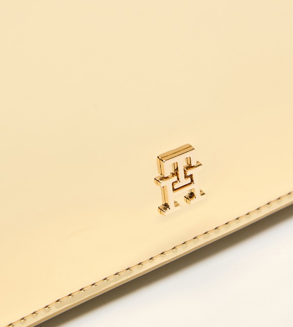 تومي هيلفيغر  شنط كلاتش - ذهبي حقائب يد