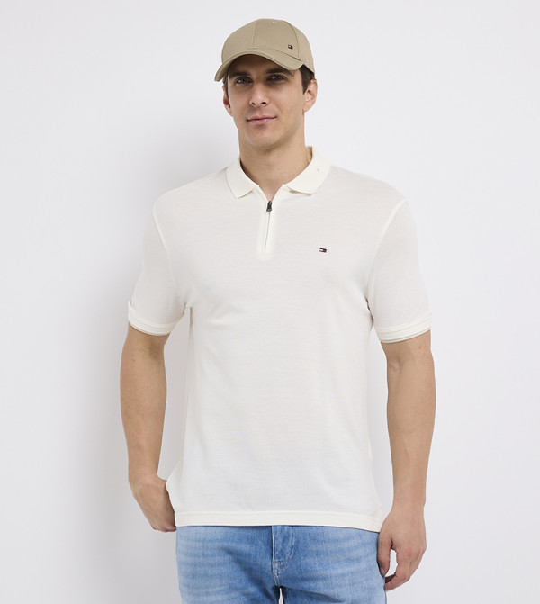 تومي هيلفيغر  ملابس - عاجي  قمصان بولو