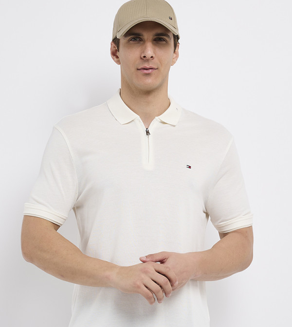 تومي هيلفيغر  ملابس - عاجي  قمصان بولو