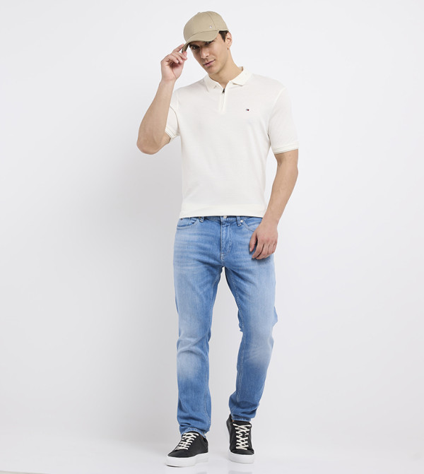 تومي هيلفيغر  ملابس - عاجي  قمصان بولو