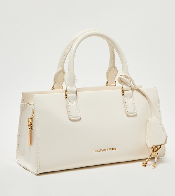 Charles & Keith Bags - Cream Handheld Bags
