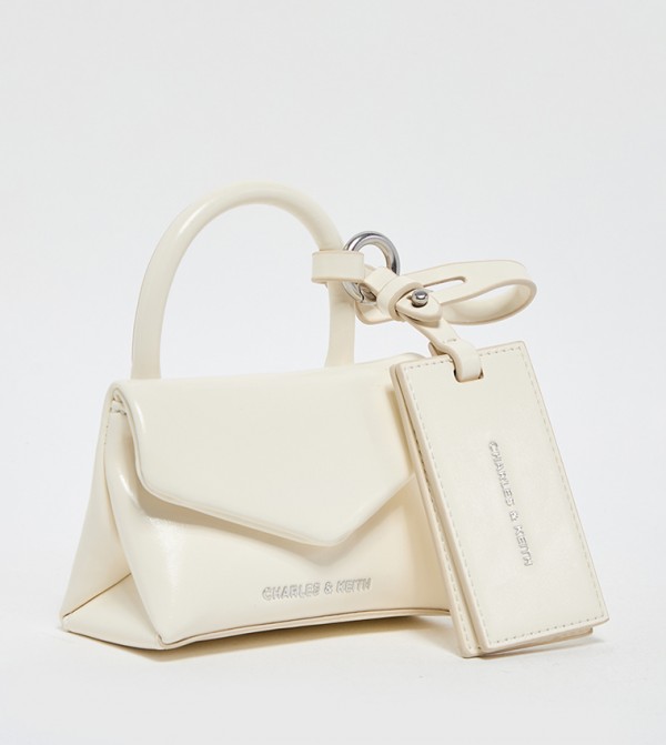Charles & Keith  Travel Accessories - Cream Key chains