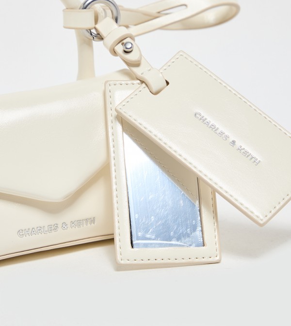 Charles & Keith  Travel Accessories - Cream Key chains