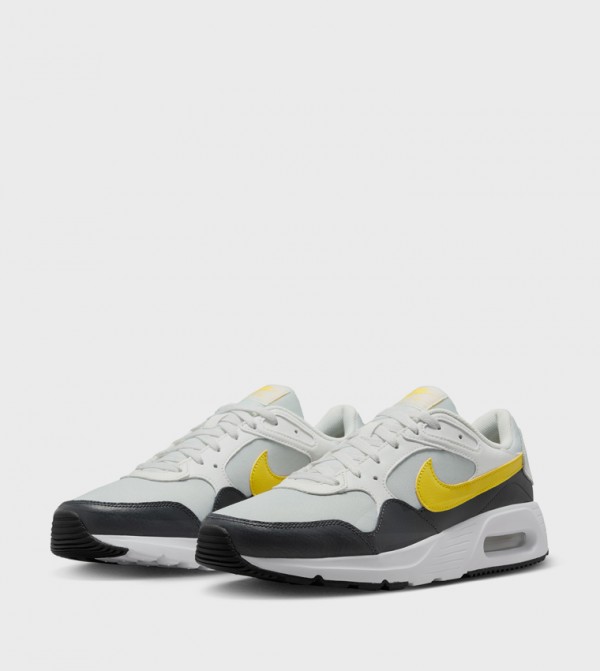 Nike  - White Low Top
