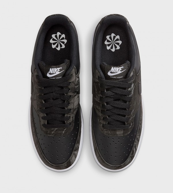 Nike  - Black Low Top
