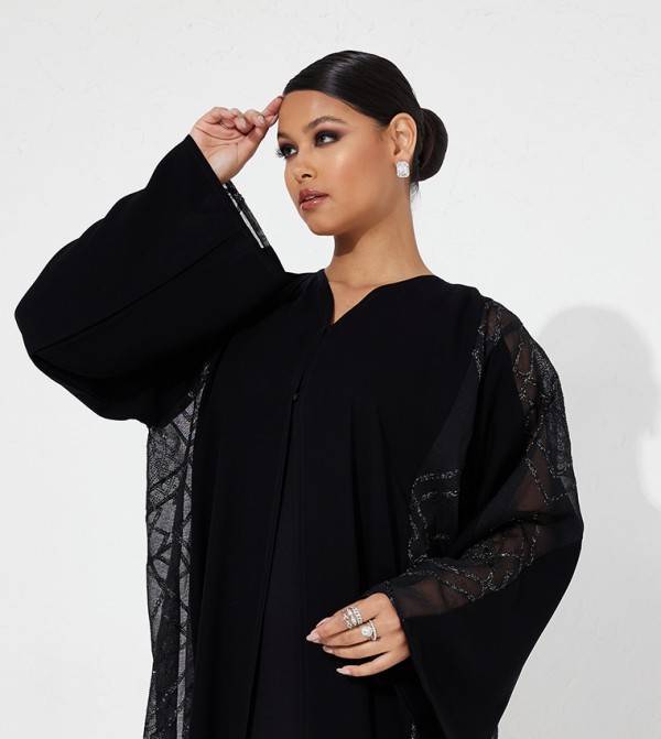 العيون للعبايات  - أسود Abayas