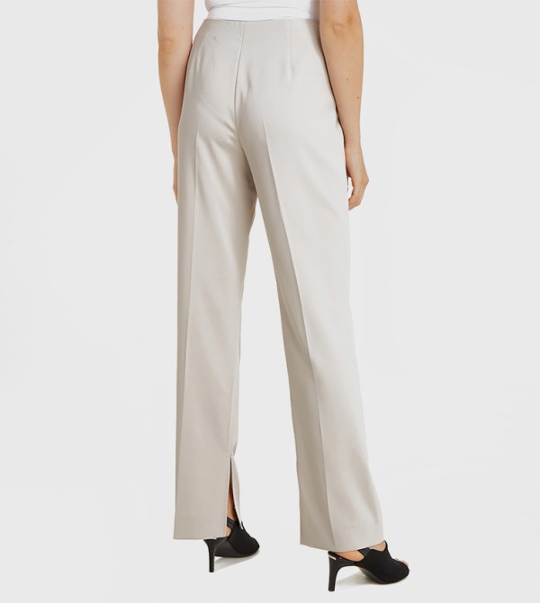 Calvin Klein  Pants & Leggings - Beige Casual Pants