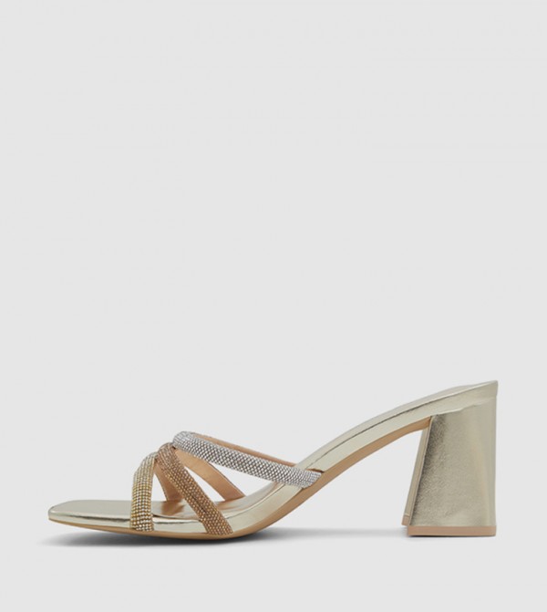 Call it Spring all-about-metallic - Gold Heeled Sandals