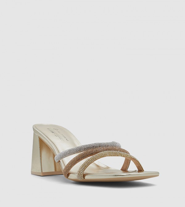 Call it Spring all-about-metallic - Gold Heeled Sandals