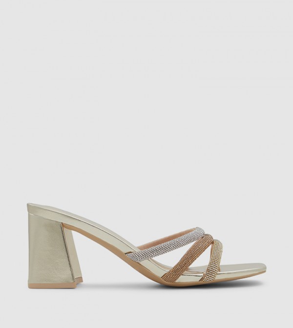 Call it Spring all-about-metallic - Gold Heeled Sandals