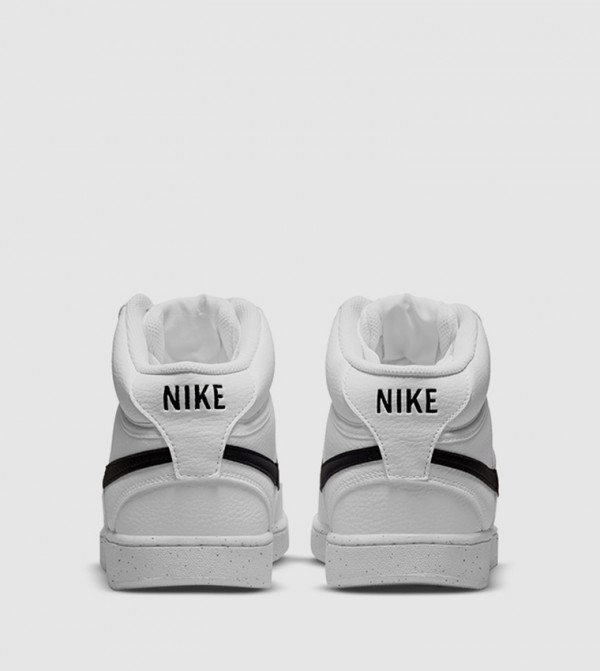 Nike  - White Mid Top