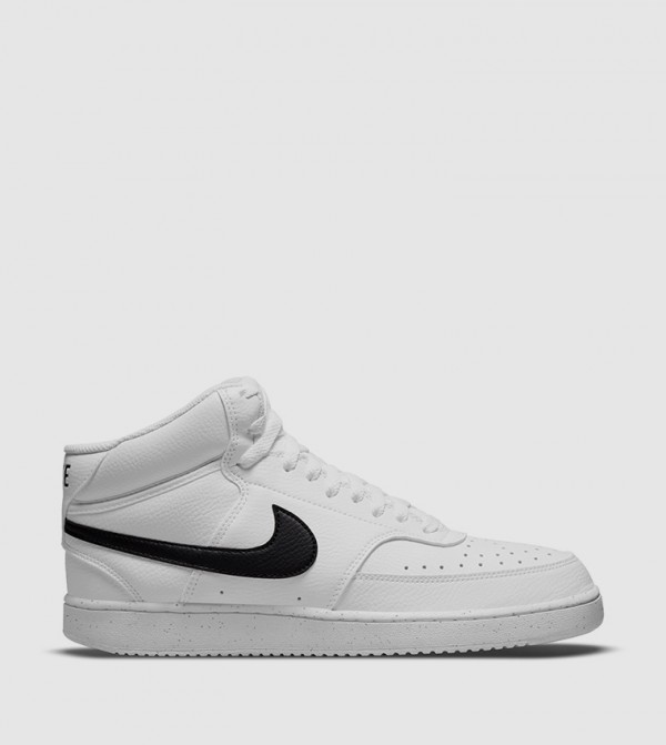 Nike  - White Mid Top