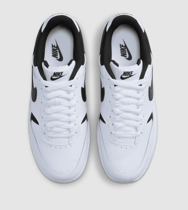 Nike  - White Low Top