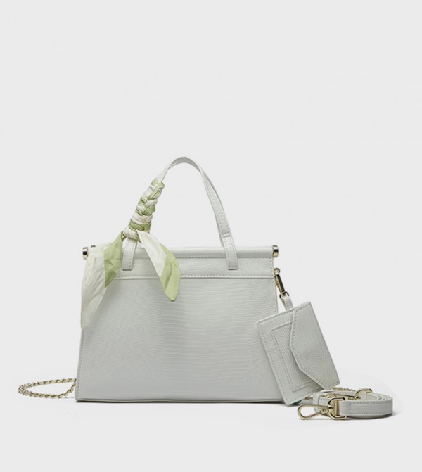 Fyor  - White Handheld Bags