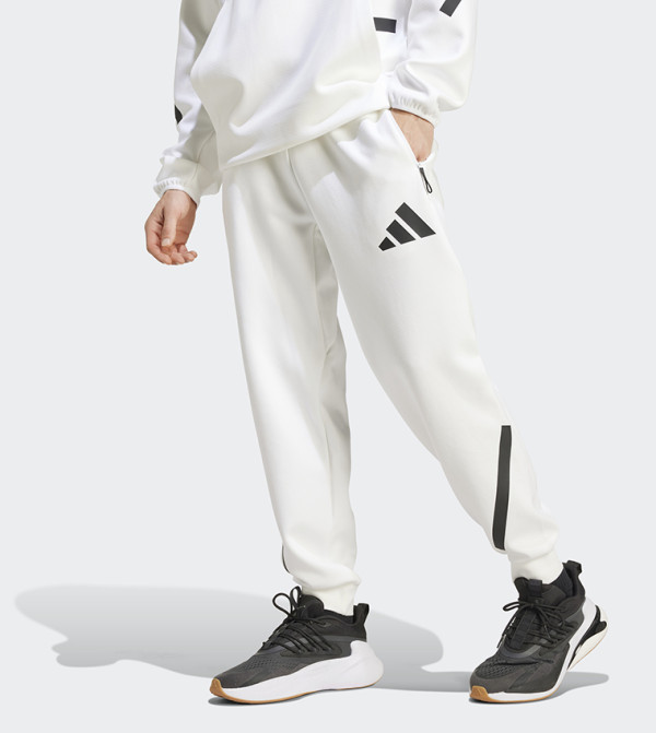 Adidas  Track Pants & Joggers - White Track Pants & Joggers