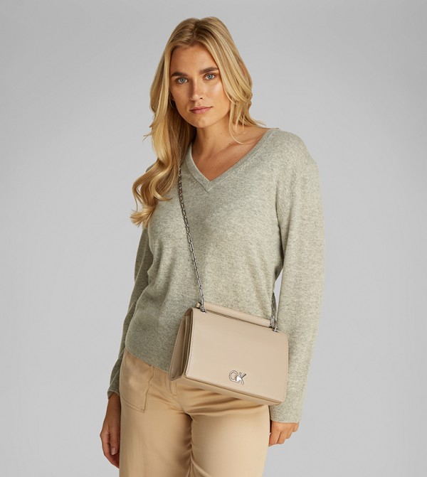 Calvin Klein Calvin Klein - Beige Handheld Bags