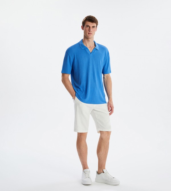 اٍل سي واي كيكي  ملابس - أزرق قمصان بولو