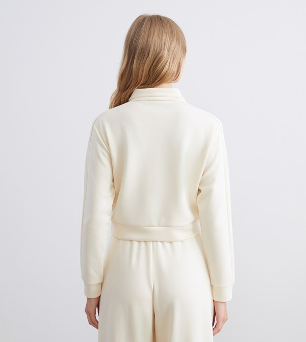 اٍل سي واي كيكي  ملابس - كريمي  بلوزات