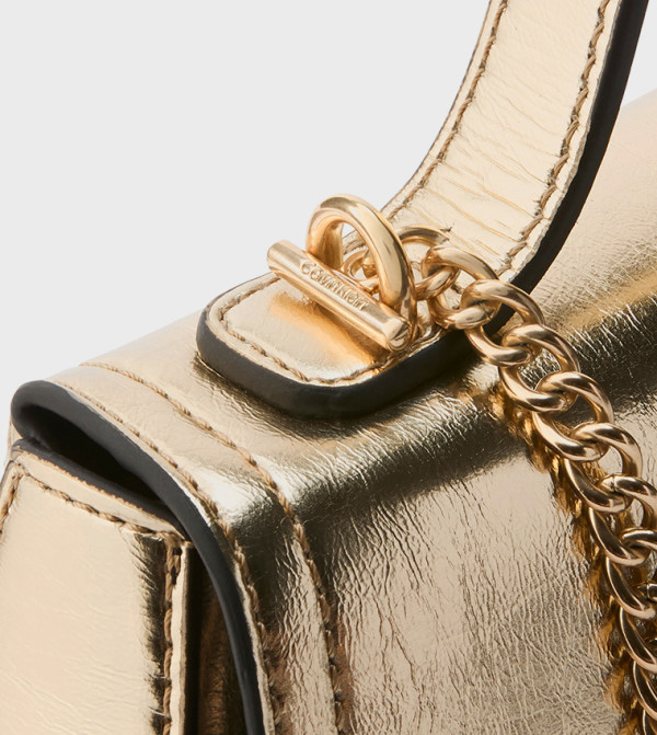 Calvin Klein Calvin Klein - Gold Handheld Bags