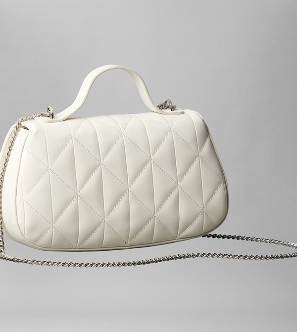 Calvin Klein  Bags - Beige Handheld Bags