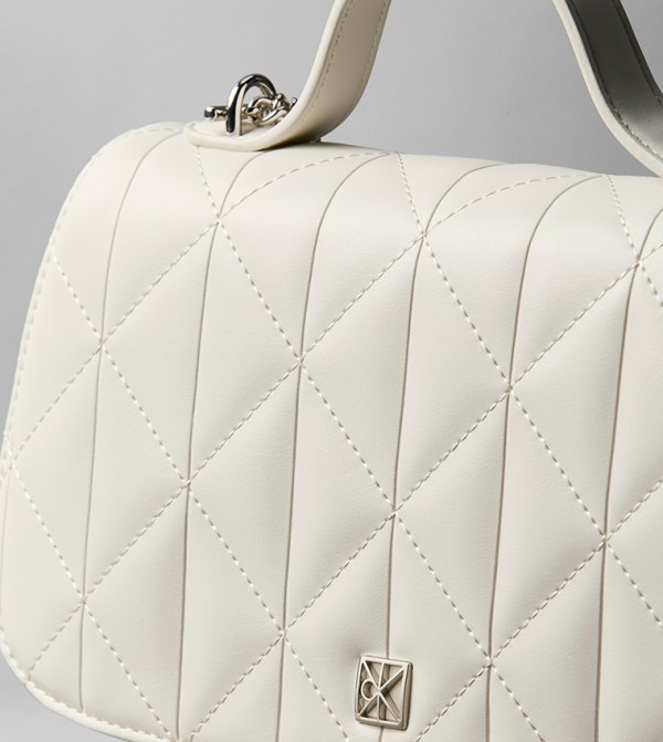 Calvin Klein  Bags - Beige Handheld Bags