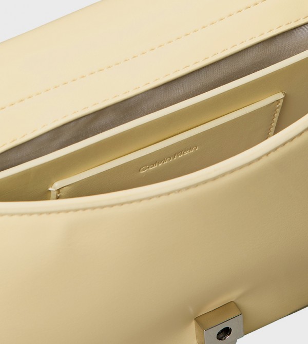 Calvin Klein  Bags - Beige Handheld Bags