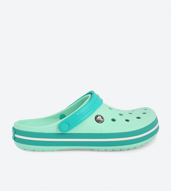 mint colored crocs