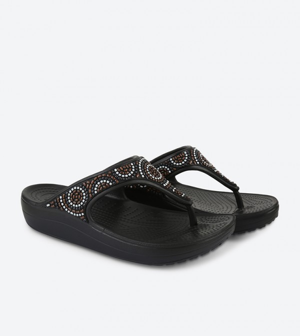 black beaded flip flops