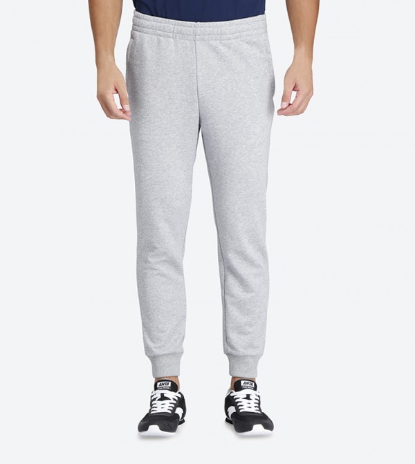 light grey trackies