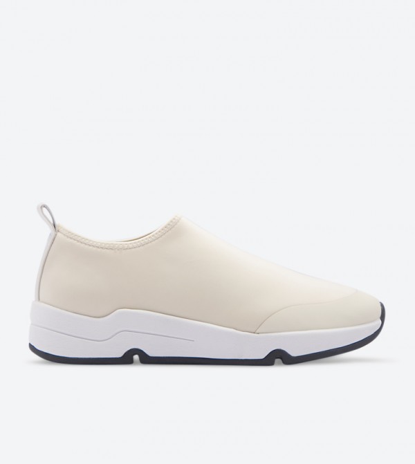 cream slip on sneakers