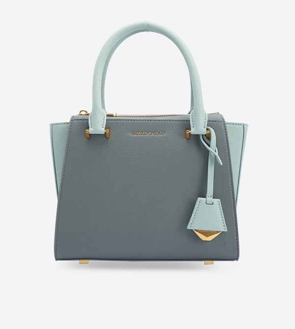 charles & keith structured trapeze bag