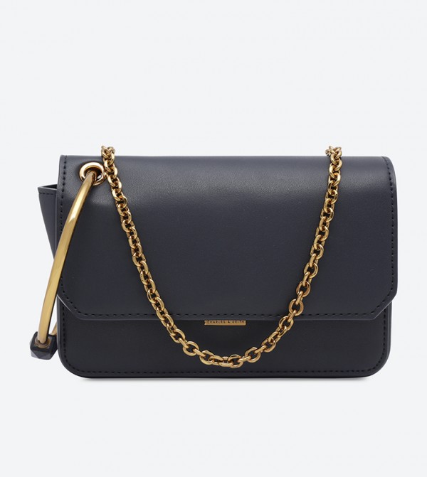 charles and keith circular handle clutch