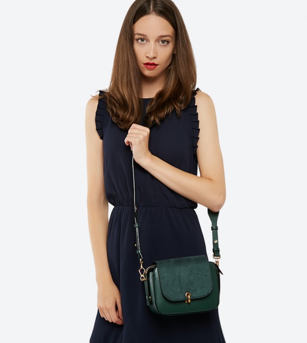 grommet detail strap bag