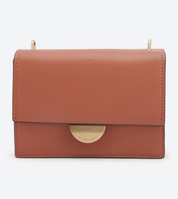 charles and keith metallic accent push lock bag