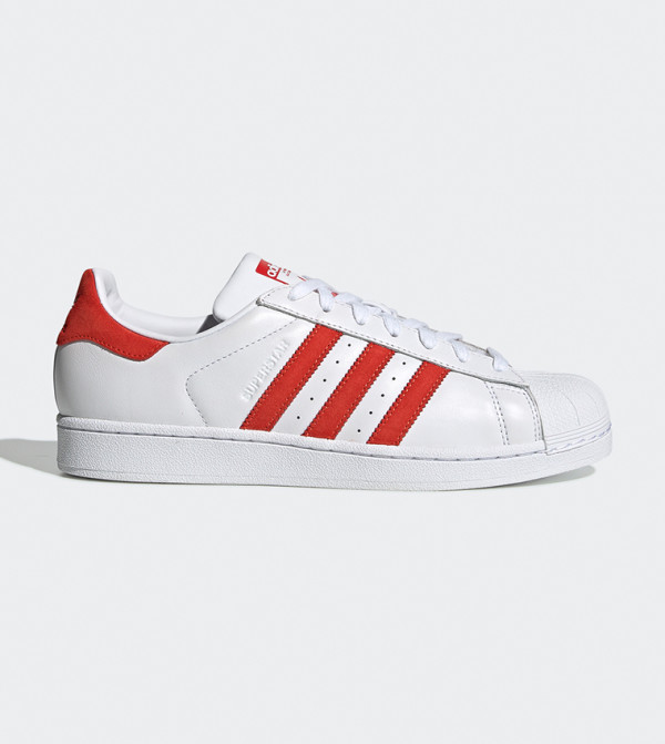 red leather adidas