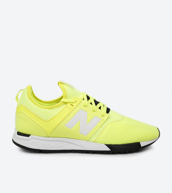 mustard colored tennis shoes
