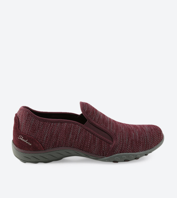 red skechers slip on