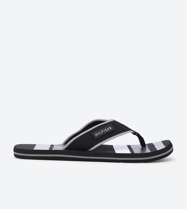 black beach flip flops