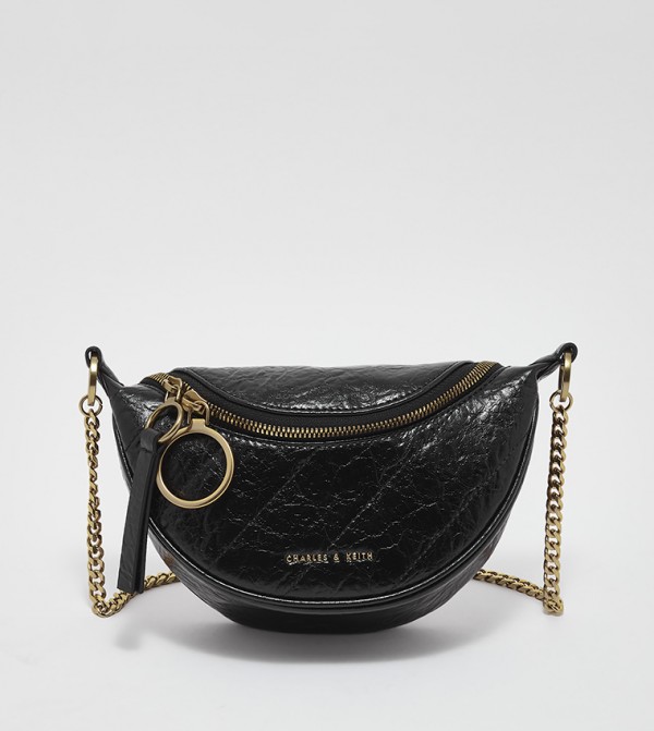 Charles & Keith TEXTURED HALF MOON CROSSBODY BAG ($59) ❤ liked on