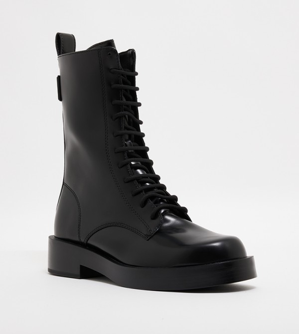 Buy Charles Keith Lace Up Calf Boots In Black 6thStreet UAE